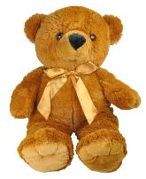 plush brown bear with gold ribbon